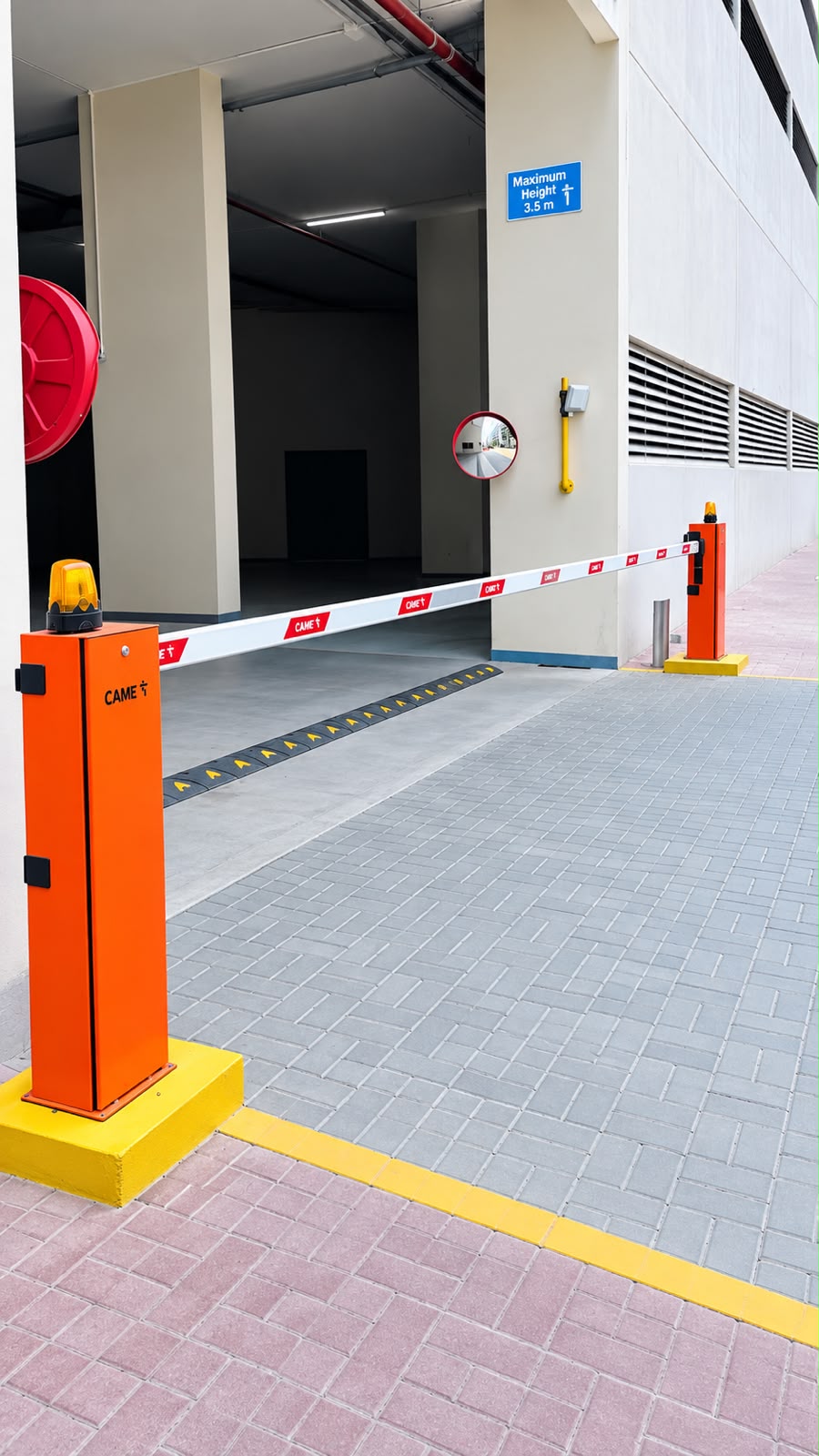 Drive unit and track detail at the side of a sliding barrier