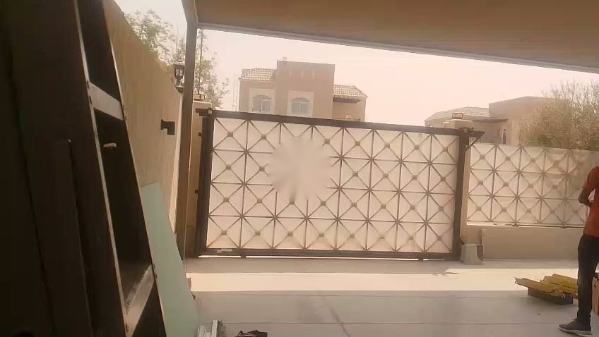 Nice sliding gate motor opening a decorative villa gate in Living Legends, Dubai