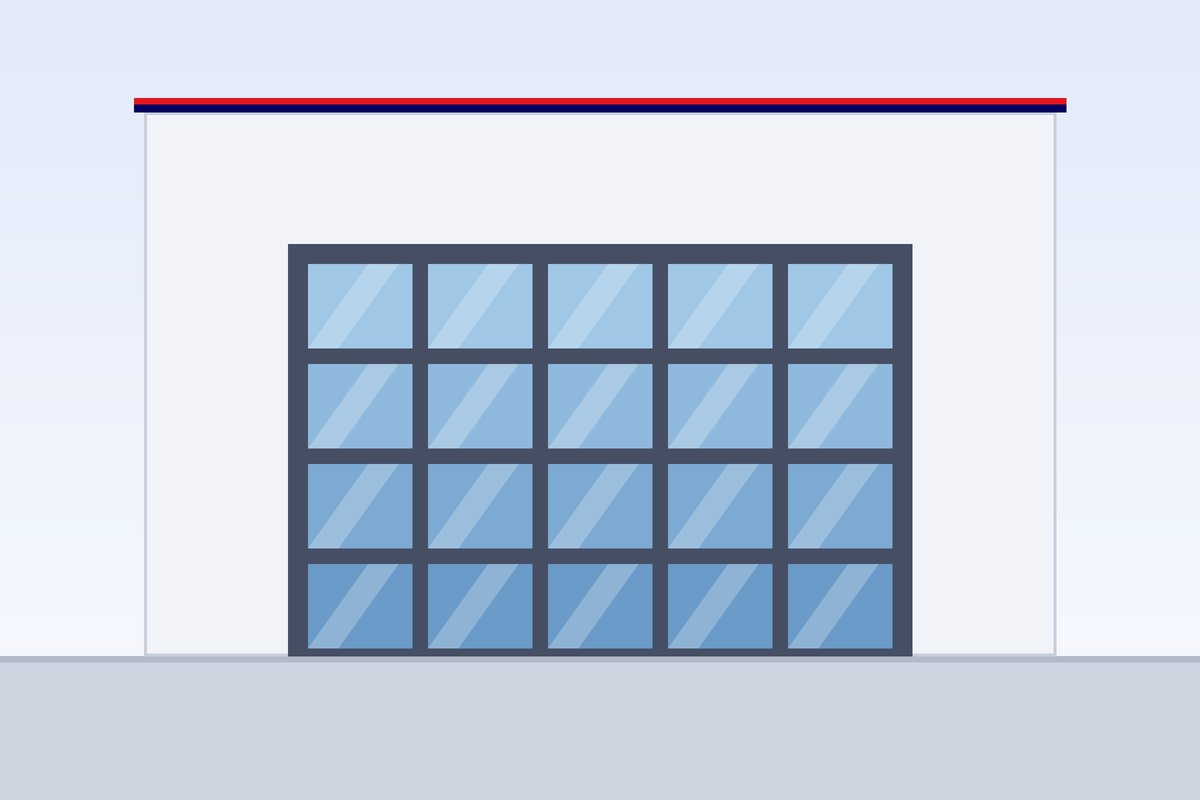 Glazed panoramic garage door on a modern villa facade