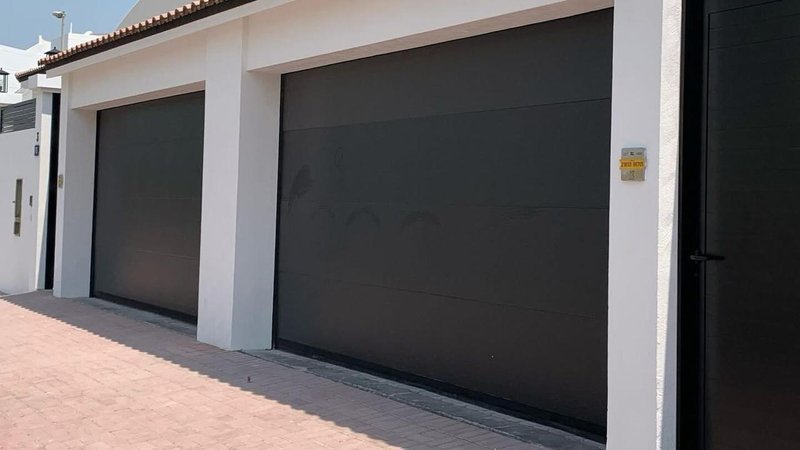 Automatic Residential & Industrial Sectional doors - automatic doors & gates by Qasar Al Neil Automatic Doors